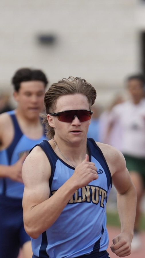 First step up | Junior Jacob Brawley
crosses the finish line in his first 400
meter race at the Covina 5-way event.
I felt slightly nervous during the 400
meter race but I had more confidence
in this compared to the 100 and 200
meter race.