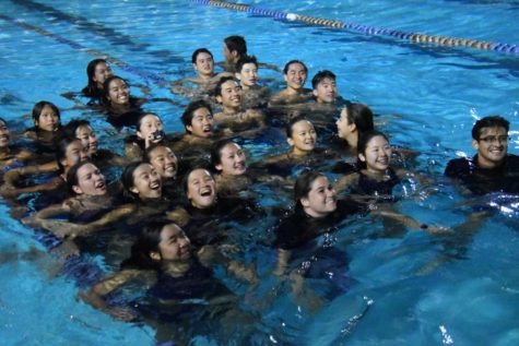 Varsity swim conquers League Finals