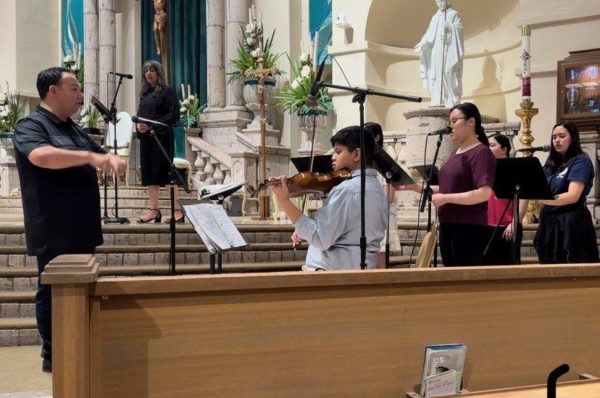 Violinist sophomore Lucas Villareal performs in his church orchestra along with the church choir. “Playing at church makes me really happy. [Performing] with my church orchestra gives me a sense of belonging and it feels like home,” Villareal said.