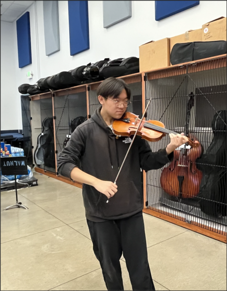 Violinist sophomore Thompson Lee practices for a possible upcoming challenge.