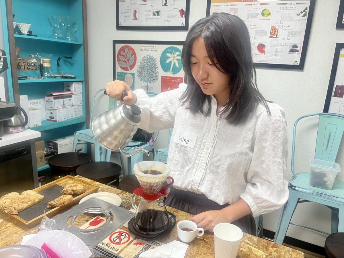 Print EIC senior Cathy Li begins creating her first pour-over coffee in a drip cup. “The coffee-making process [was] intricate, but the routine was relaxing,” Li said.