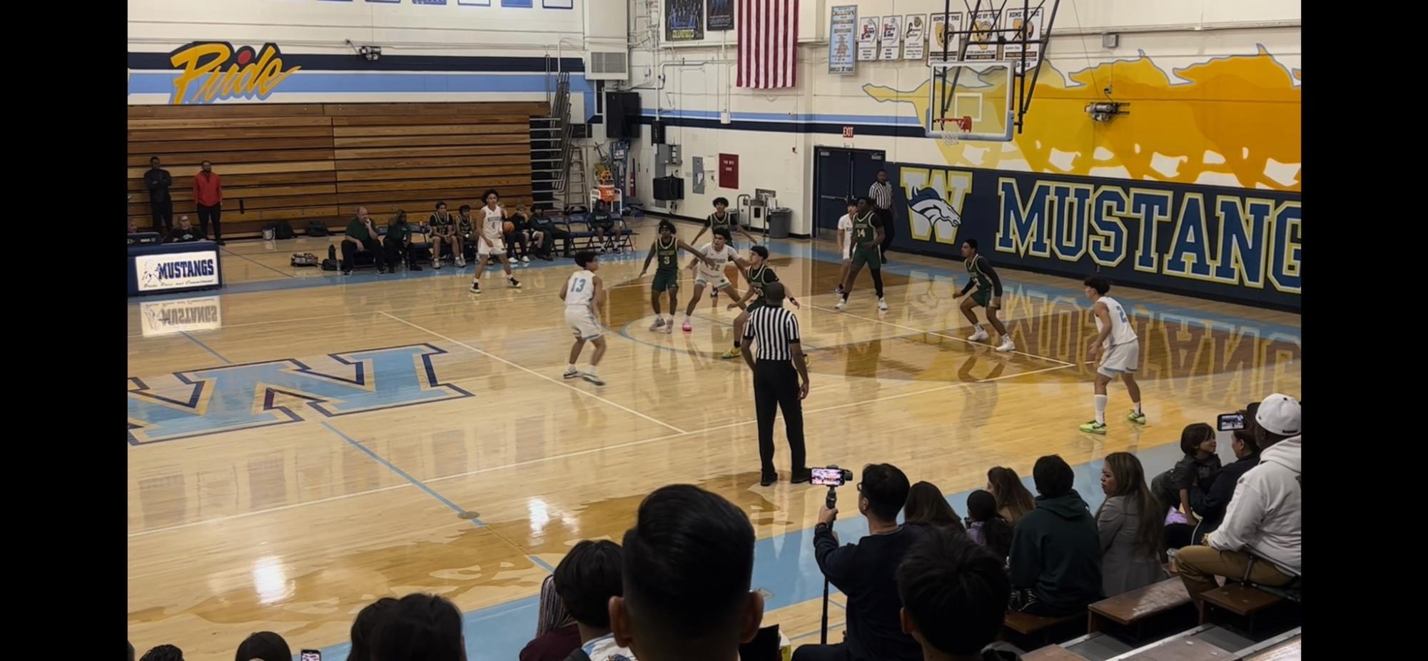 Senior point guard Joshua Magno tries to find an opening for his teammates to score. 
