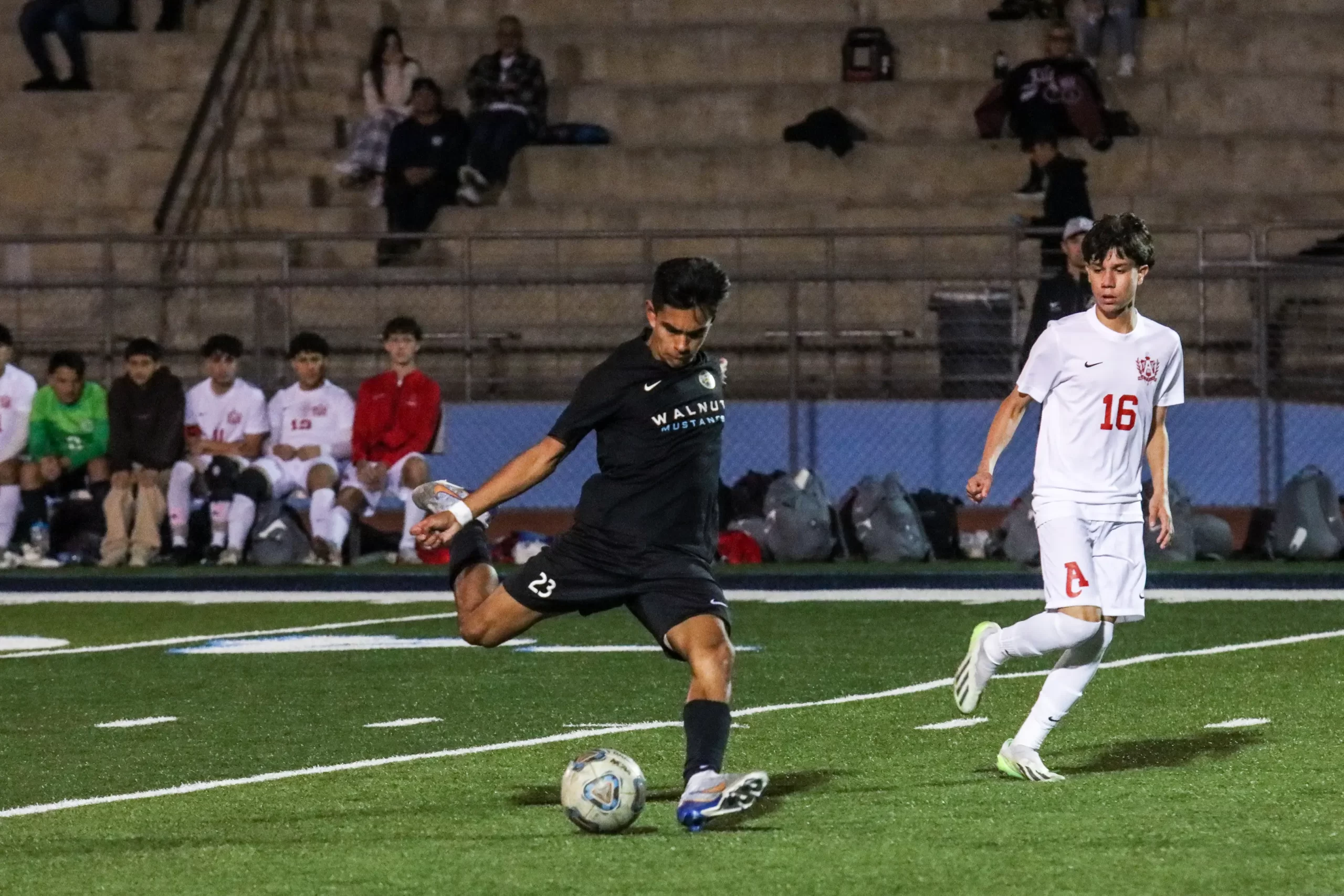 Defensive midfielder sophomore Nathan Sesma takes a shot at the goal, as he plans to advance the offense. “I had a bunch of open space, and I was feeling happy and content with the position I was on at the field,  Sesma said. 
