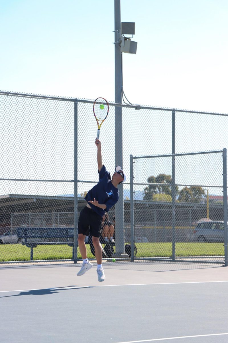 Singles three junior Tyler Wu starts off the point and sets the tone
for the game. “It’s really important to serve well. I felt confident with my shots and in control throughout the whole match,” Wu said. 