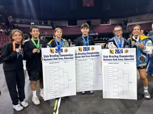 Members of the varsity wrestling team win the 2024 CIF state championships, with 6 total state medalists.