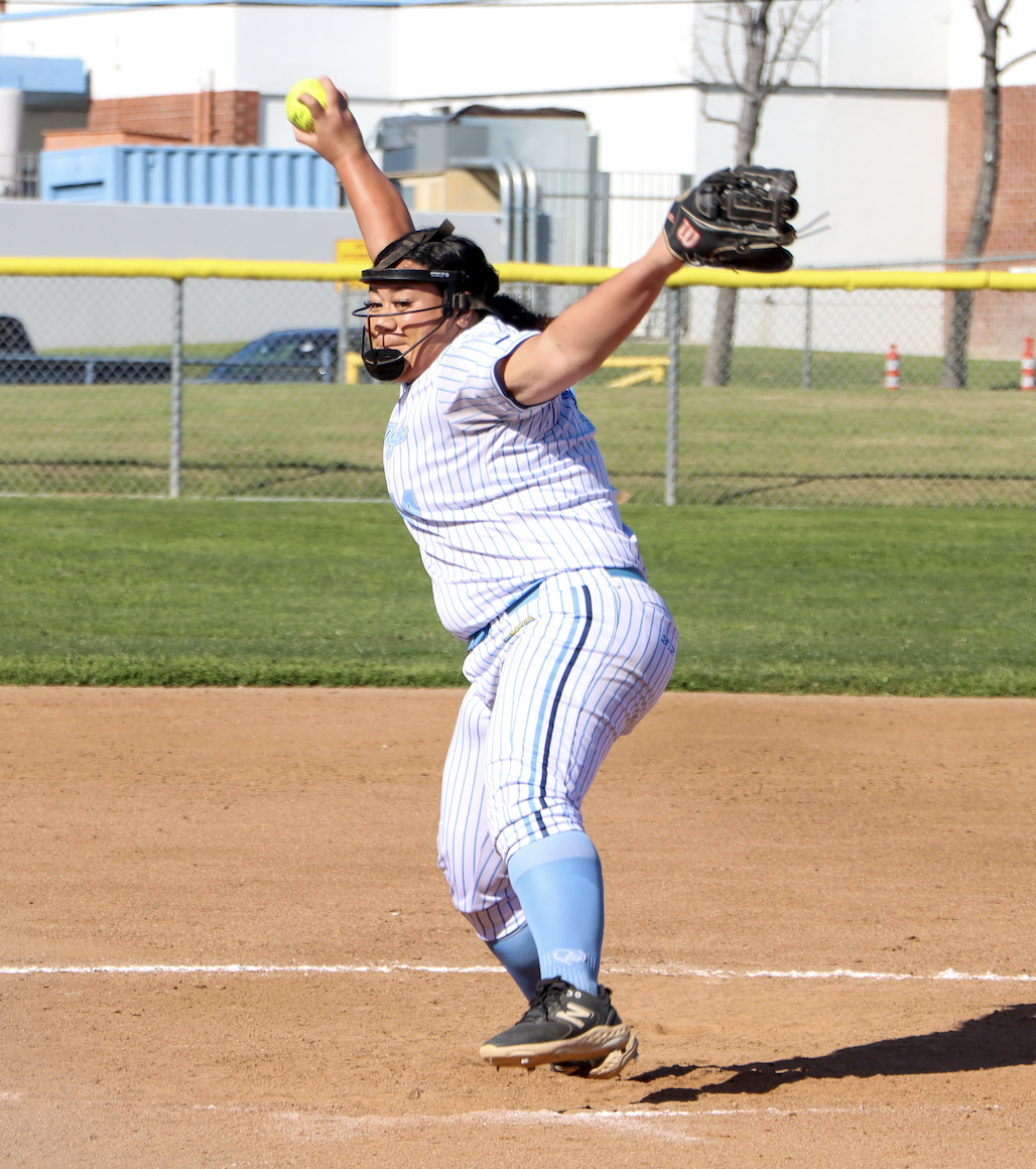 Winding up | Pitcher senior Sela Halaholo secures the win with a strong throw. “The game was really high intensity, and it was kind of stressful. I feel like I pitched well and minimized the points Rowland scored,” Halaholo said. 