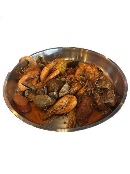 Grab A Crabs seafood boil with a mix of shrimp, clam, sausage and corn comes with a savory sauce as well as tender meats which makes for a nice and filling meal for two.