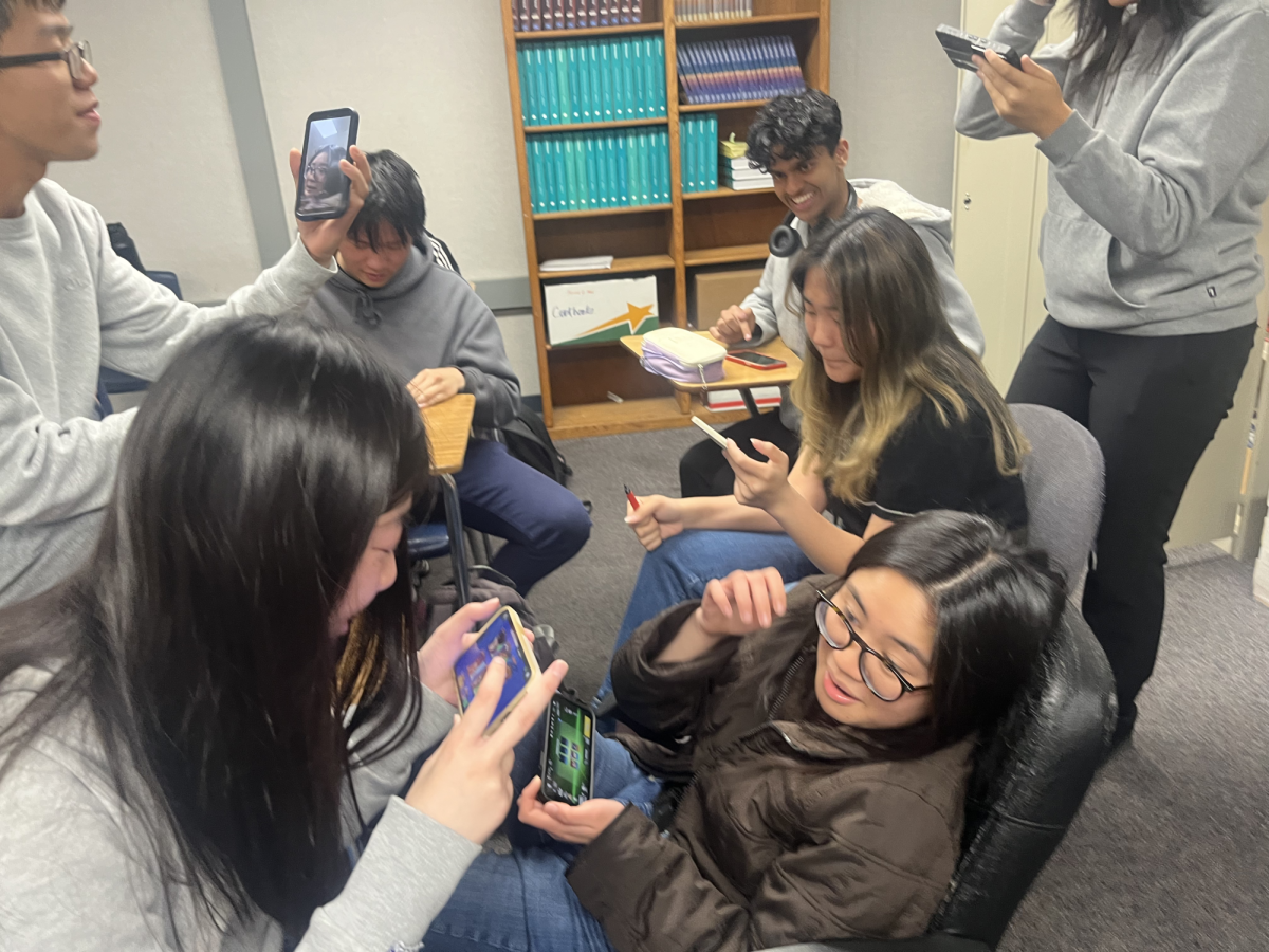 Students play Brawl Stars during class, hindering student focus on the subject.