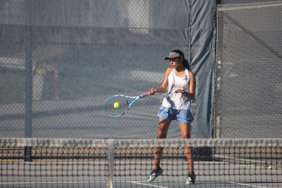 Hitting with precision | Doubles one senior Abigail D’Souza wins her round two match 6-2, as she returns her opponent’s serve. “The match went really well. We were more consistent and had better strategies.” 