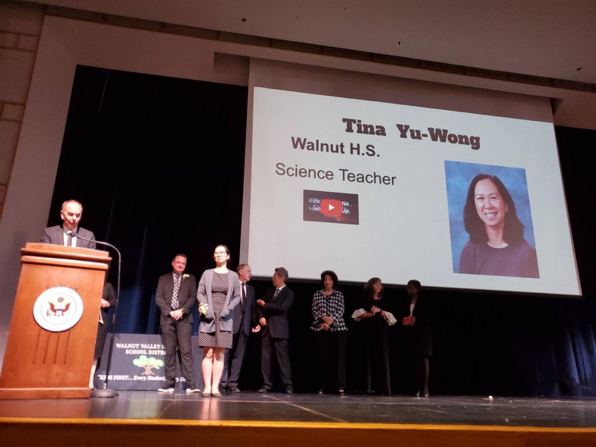 Chemistry teacher Tina Yu-Wong is honored at the "Salute to Teachers" event.  