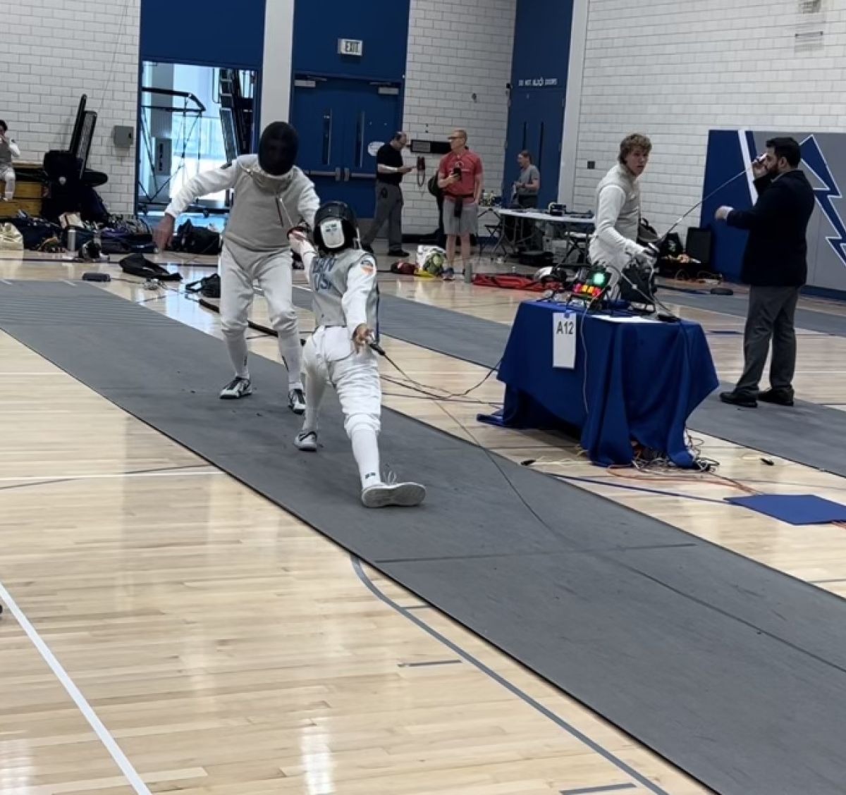 Sophomore Kevin Zhan places third in fencing at the Air Force Academy in Denver, Colorado.