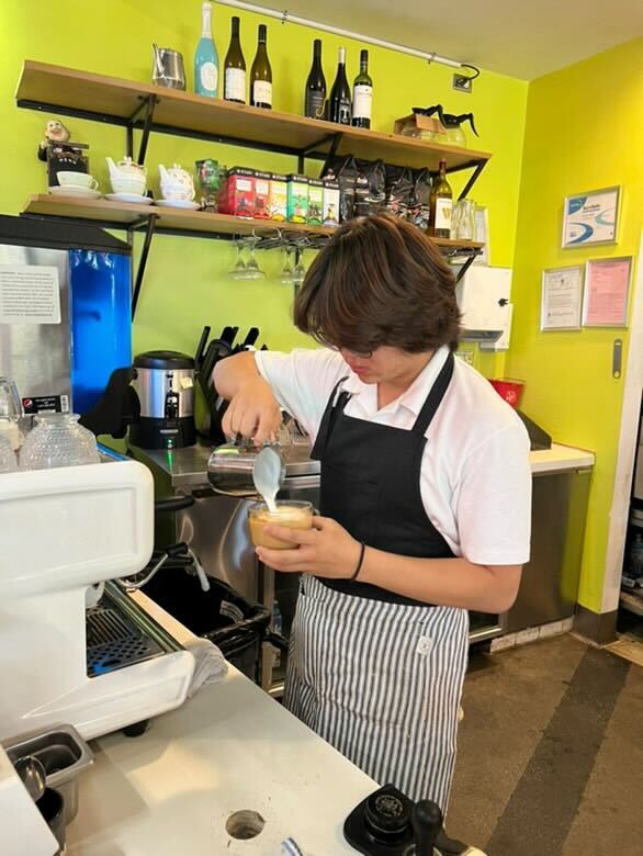 Senior Daniel Hong creates latte art in the shape of a heart at the Lemon Tree Cafe. “It’s not always perfect but when I make the perfect heart, it makes me feel so accomplished and it makes me happy for the rest of the day,” Hong said. 