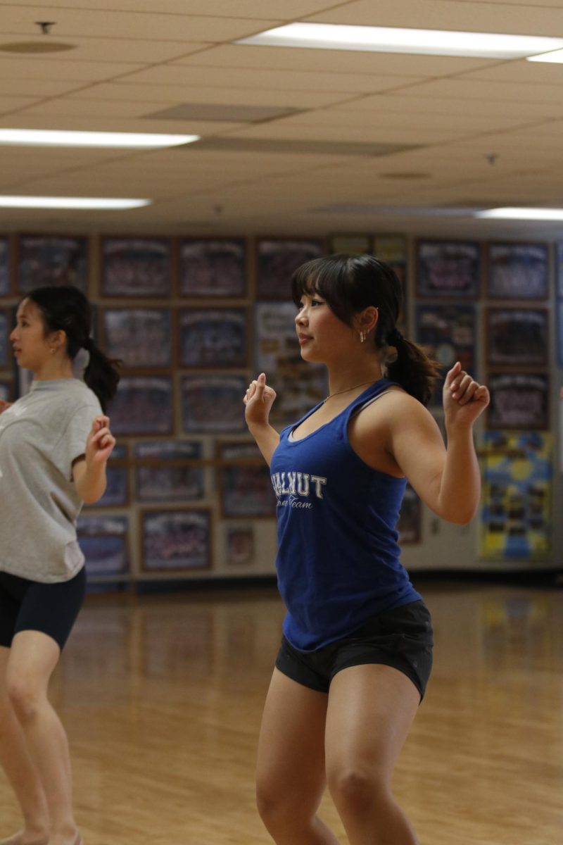 Senior Dance Team co-captain Chloe Kwei rehearses choreography.