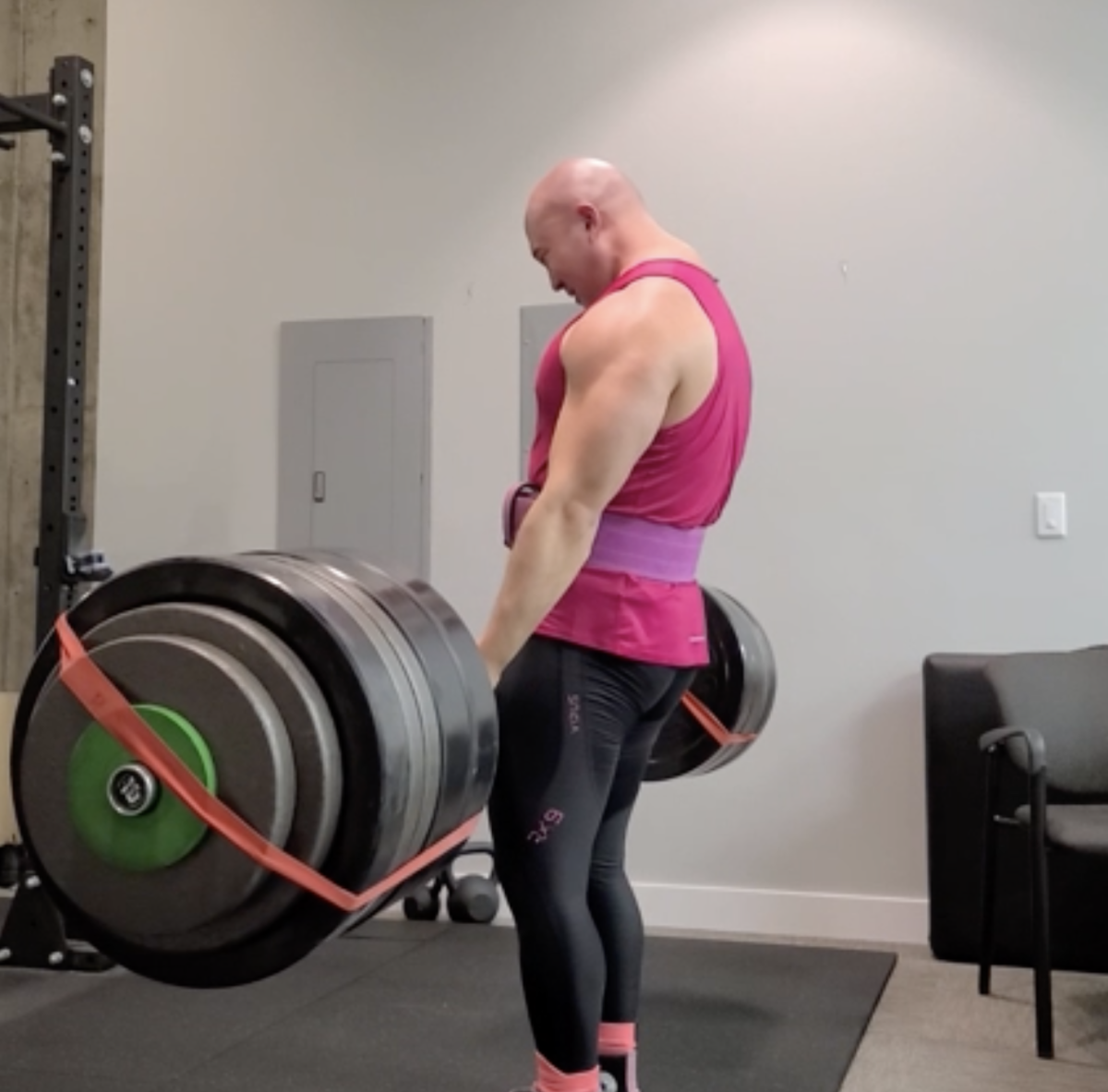 Math teacher Joseph Chon works on his deadlift personal record (PR) of 600 pounds.  