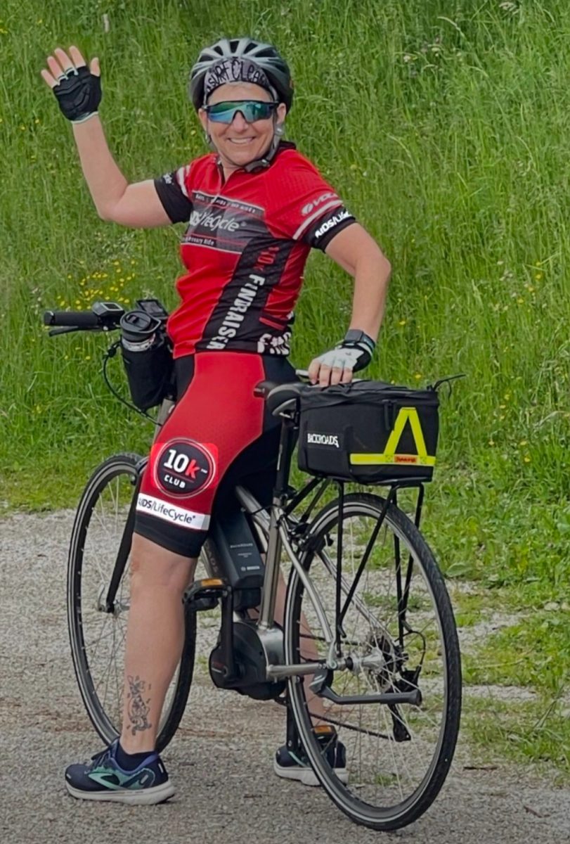 English teacher Jennifer Chalew waves while on a group ride from Slovenia to Croatia. “It was a really cool experience,” Chalew said. “We were able to stay in a palace near Lake Bled that belonged to Tito, who was the head of Yugoslavia.” 