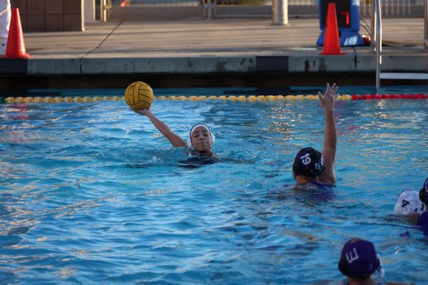 Senior Emma Baca advances the ball towards the goal.