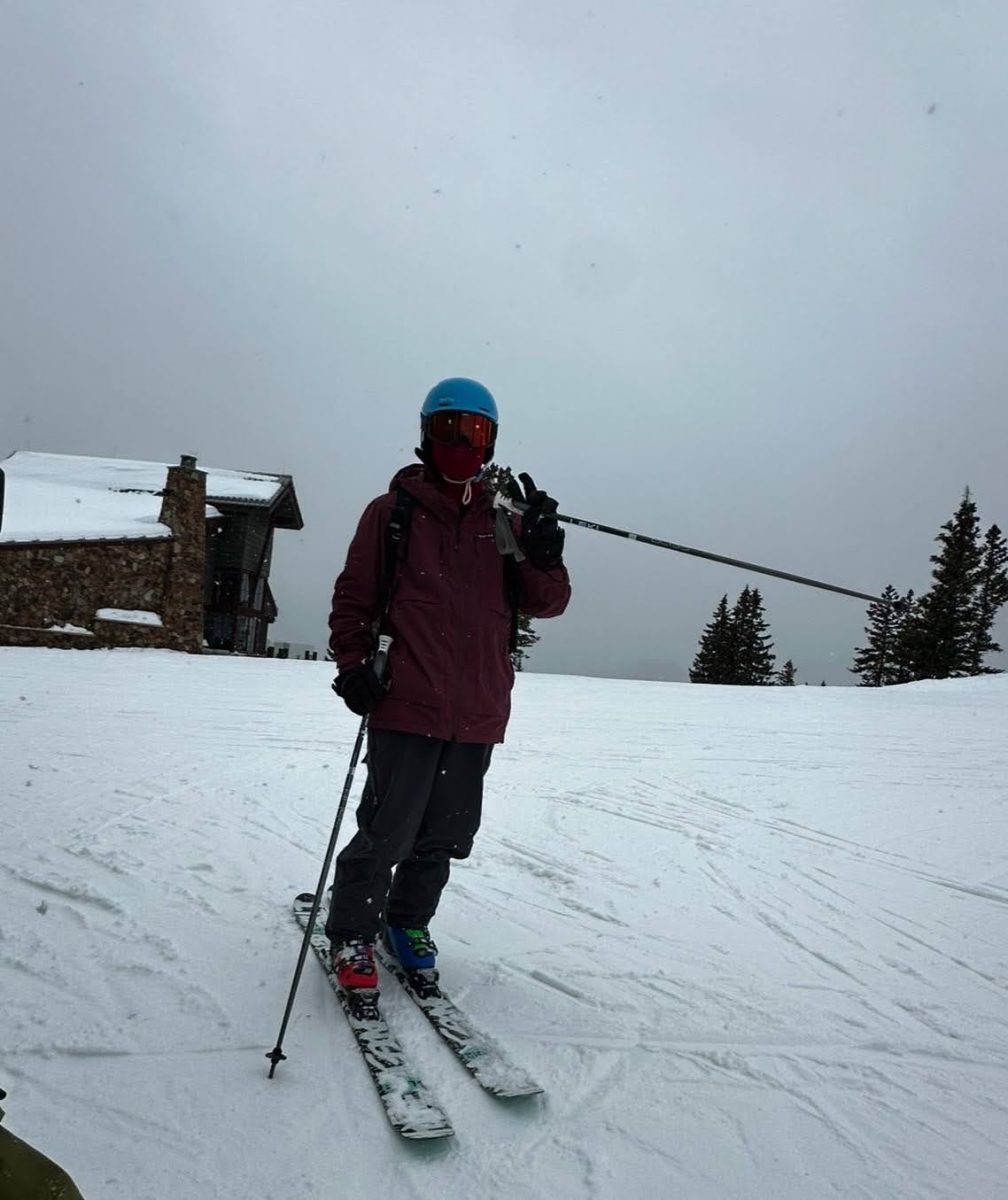 Sophomore Aaron Cho skies down a slope. 