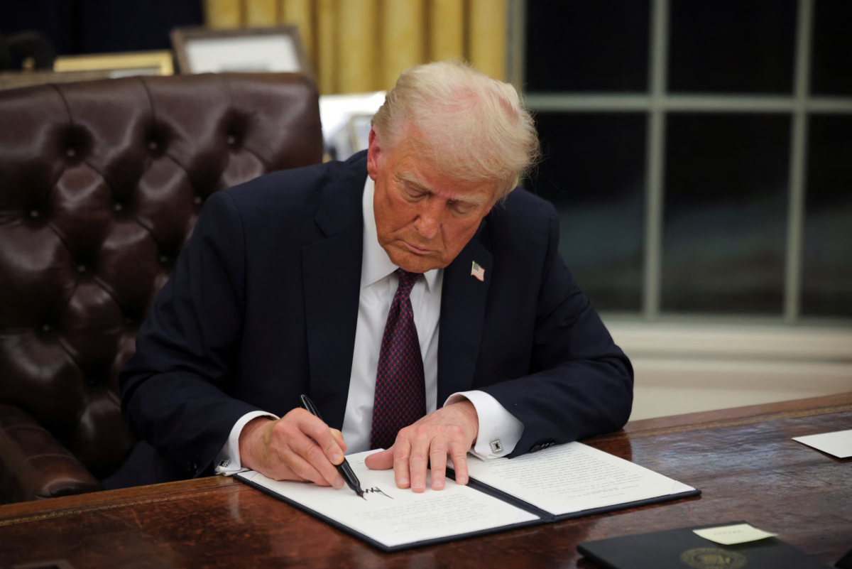 45th and 47th President Donald Trump signs an executive order allowing for TikTok to remain online for another 75 days before it is required to be banned in the U.S.