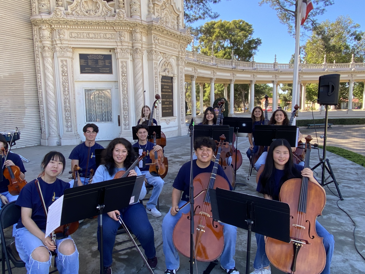 Concert and Symphonic orchestra prepare to play classic movie tunes at Balboa Park.