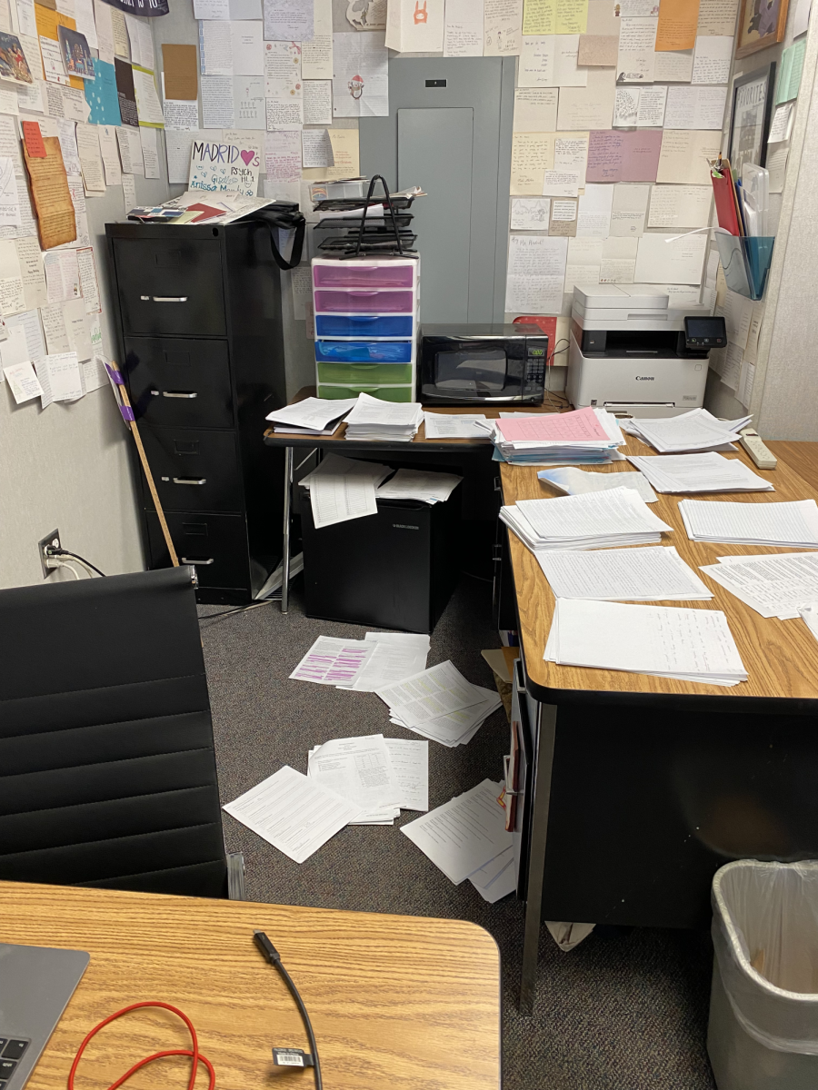 Social science teacher Nick Madrid’s desk and floor are littered by ungraded papers due to burnout. “My desk hasn’t been this messy before and it’s been this way ever [since] I started grading papers,” Madrid said.  