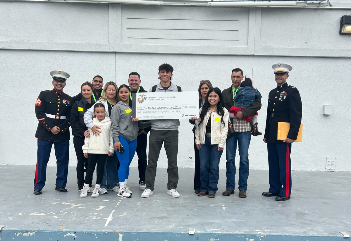 Senior Hector Hernandez with his family after receiving the NROTC scholarship.