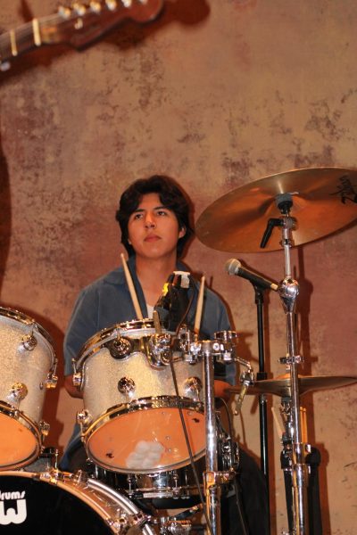 Navigation to Story: Indie rock drummer beats to the rhythm