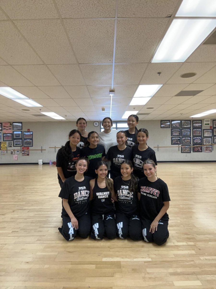 Dance Team gathers for a group photo after a hip-hop group rehearsal. In the front row, from left to right, officer junior Lydia Chen, co-captains seniors Chloe Olegario and Savannah Huang and officer junior Jocelyn Reyes. (Photo courtsey of Lydia Chen)