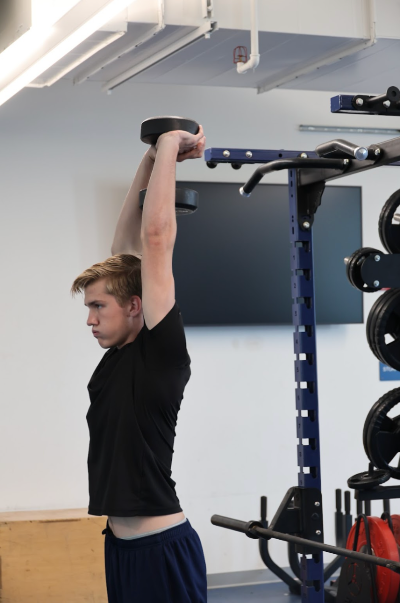 Junior Ty Thompson works out.