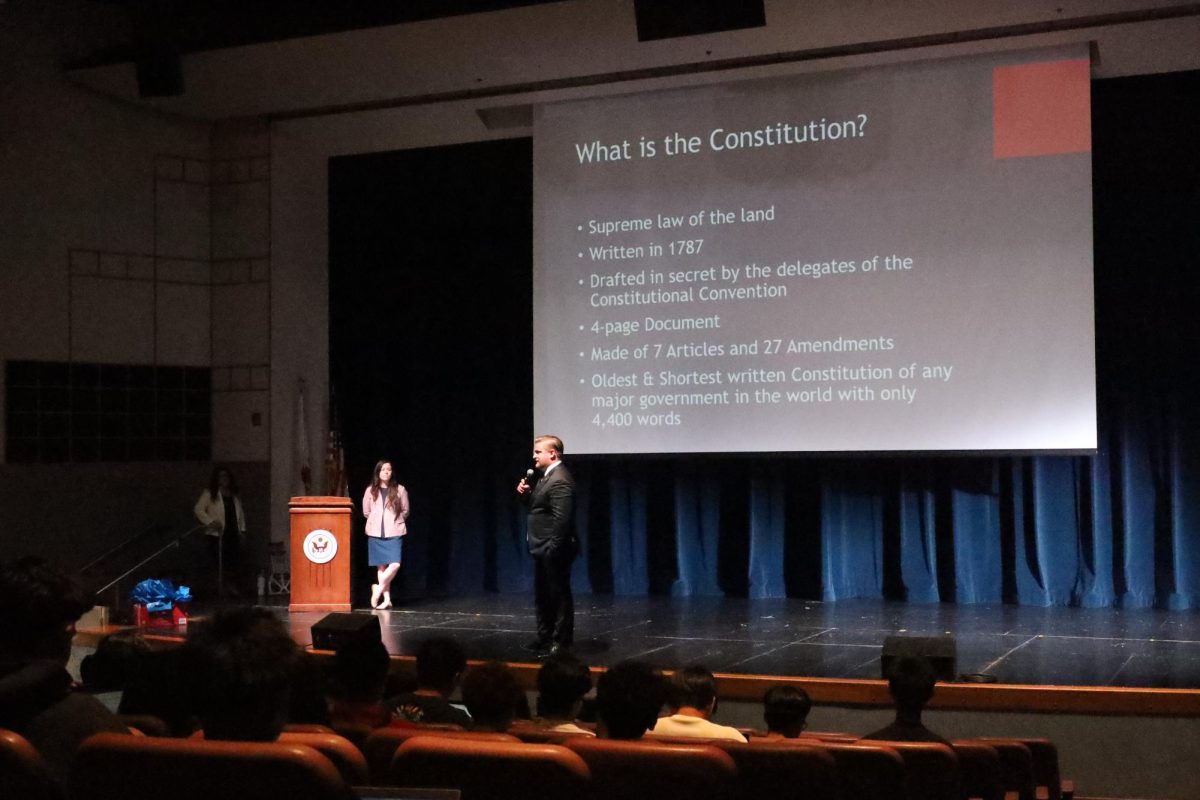 Speakers from the San Bernardino District Attorney's Office talk about the Constitution in the Performing Arts Center. 