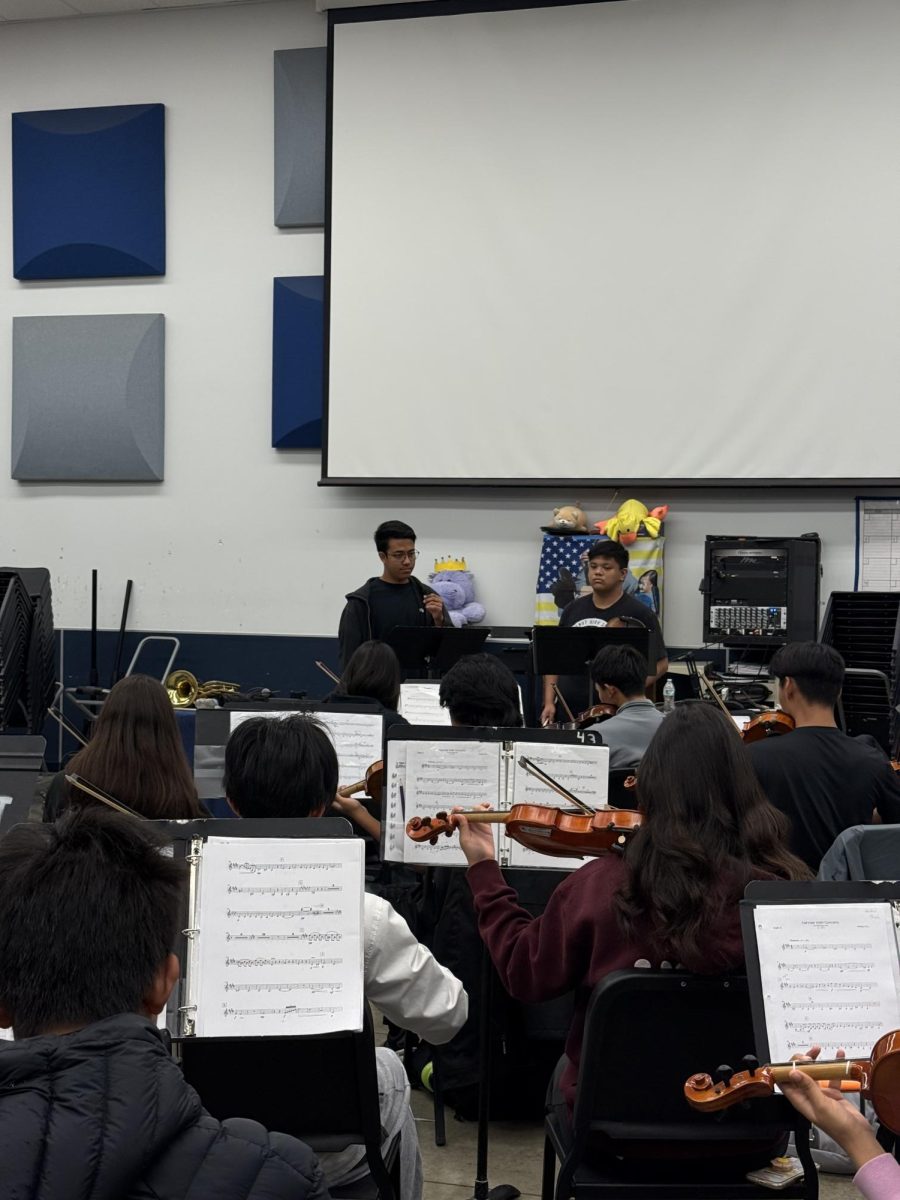 Senior Gabriel Gonzalez runs sectionals during Symphonic Orchestra. 