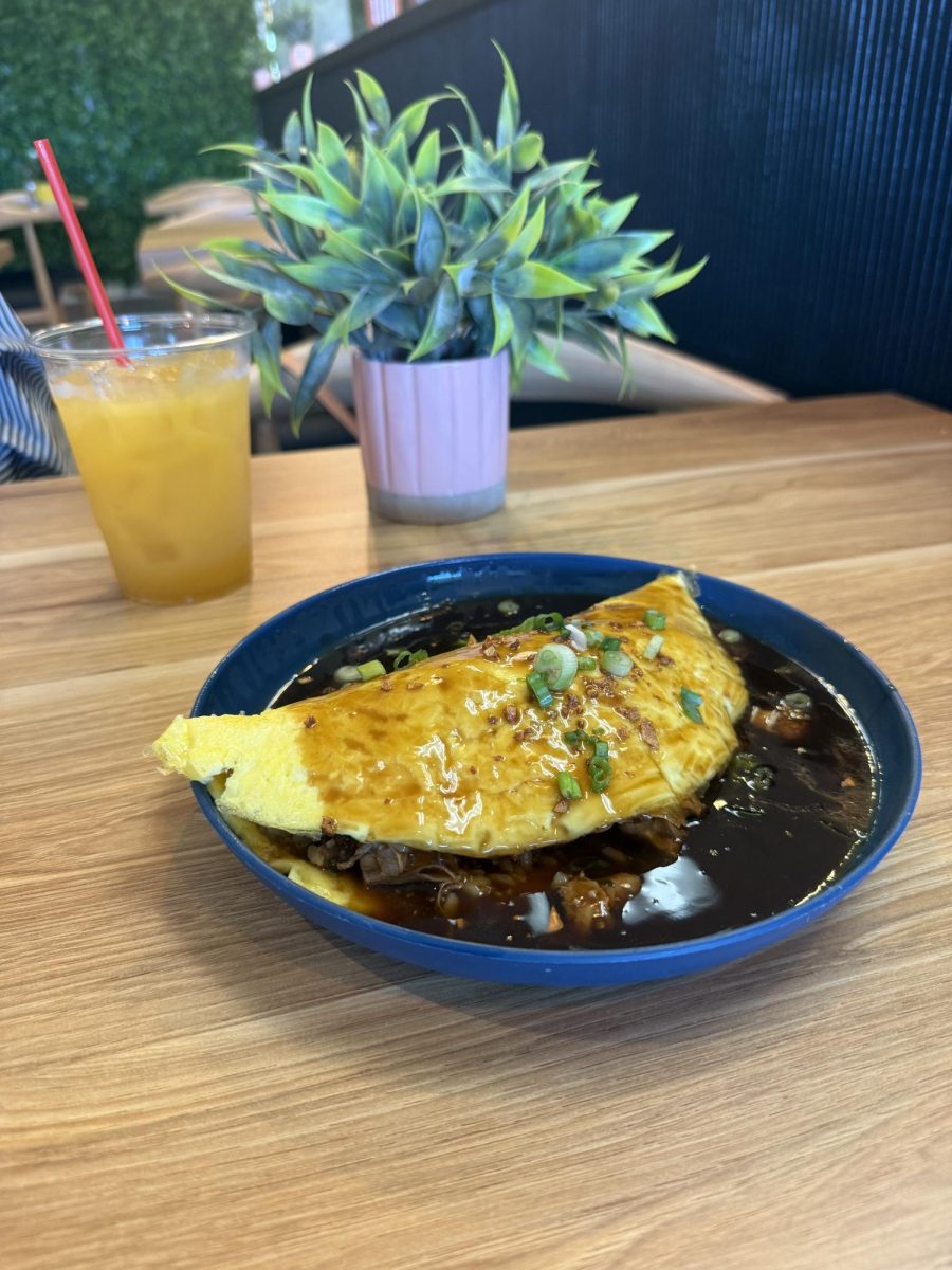 Featured above is the Filipino Mango Juice (left) and the Adobo Rice Omelette (right) from Lola's by MFK. 