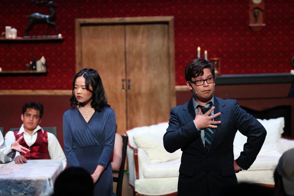  From left to right, junior Hannah Phan, who played Connie Philips, and sophomore Matthew Salguero, who played Roy Philips, shows his character’s personality and relationship with Edward Worthington. “We [were] all doing our best to portray the characters accurately,” Salguero said. 