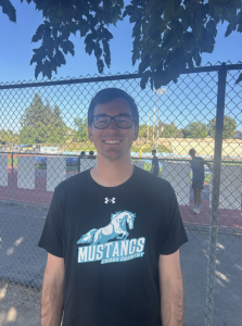 Head cross country coach Nathan Meier outside around the track.