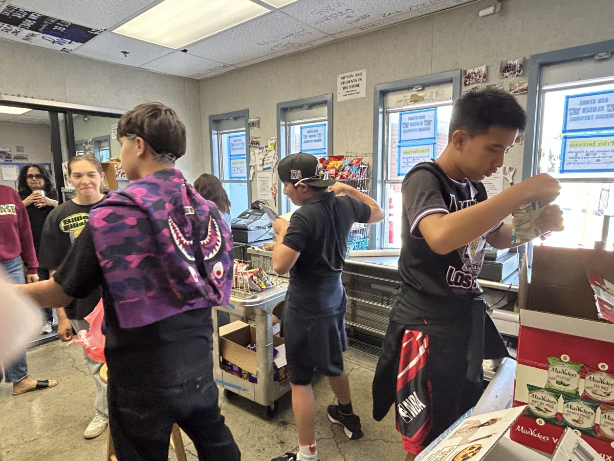 Students in the new transition class work at the ASB store.