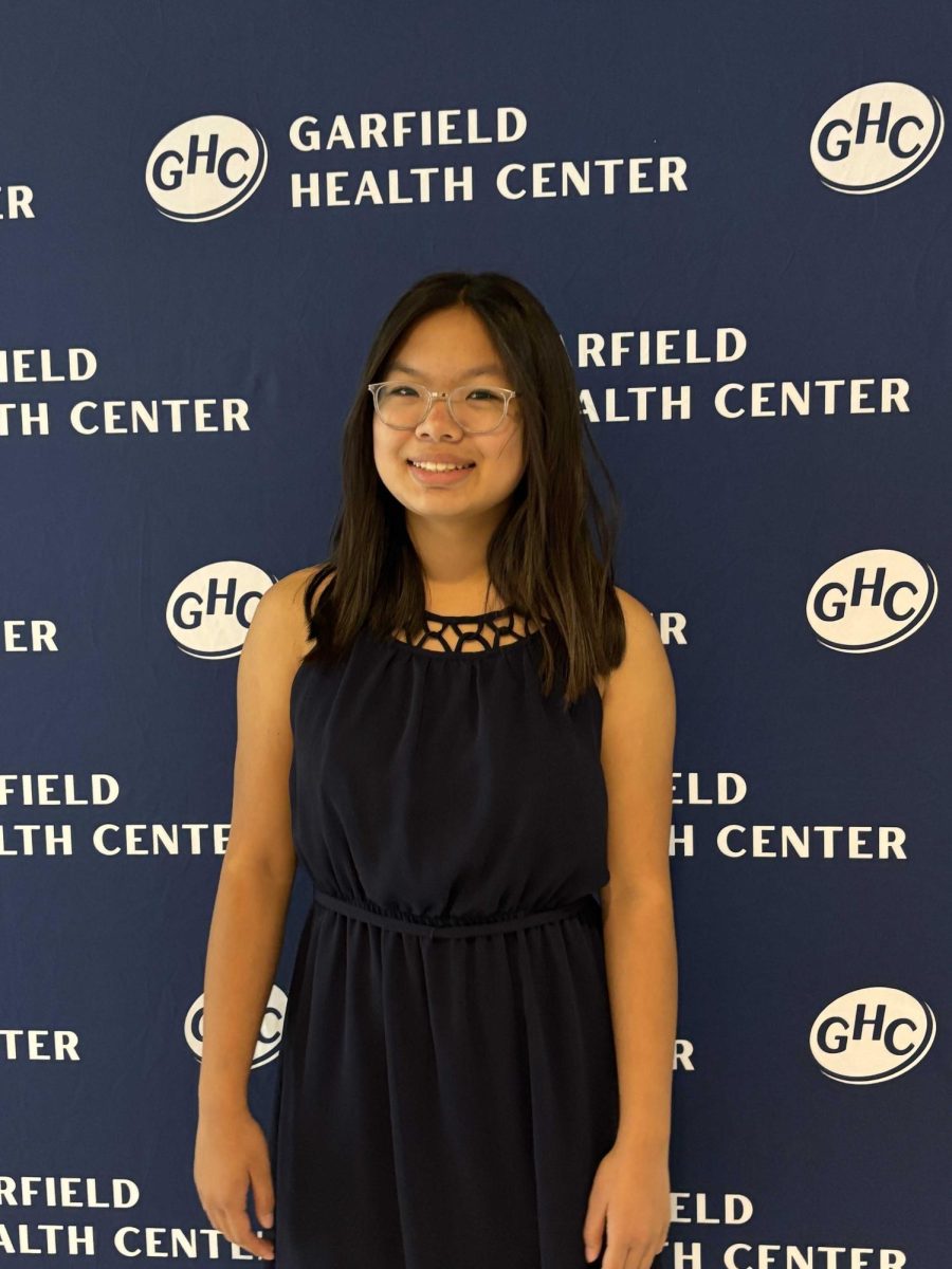 Posing for a photo are the Garfield Health Center event. Senior Canise Lee smiles proudly at her achievements of organizing it as president of the Youth Ambassador program and founder of the Walnut Garfield Health Center (GHC) Youth Coalition club. 