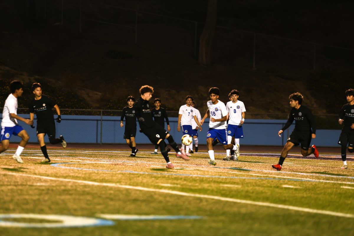 Control of the ball | Midfielder senior Jaiden Temores focuses on controlling and keeping the ball during the game. 