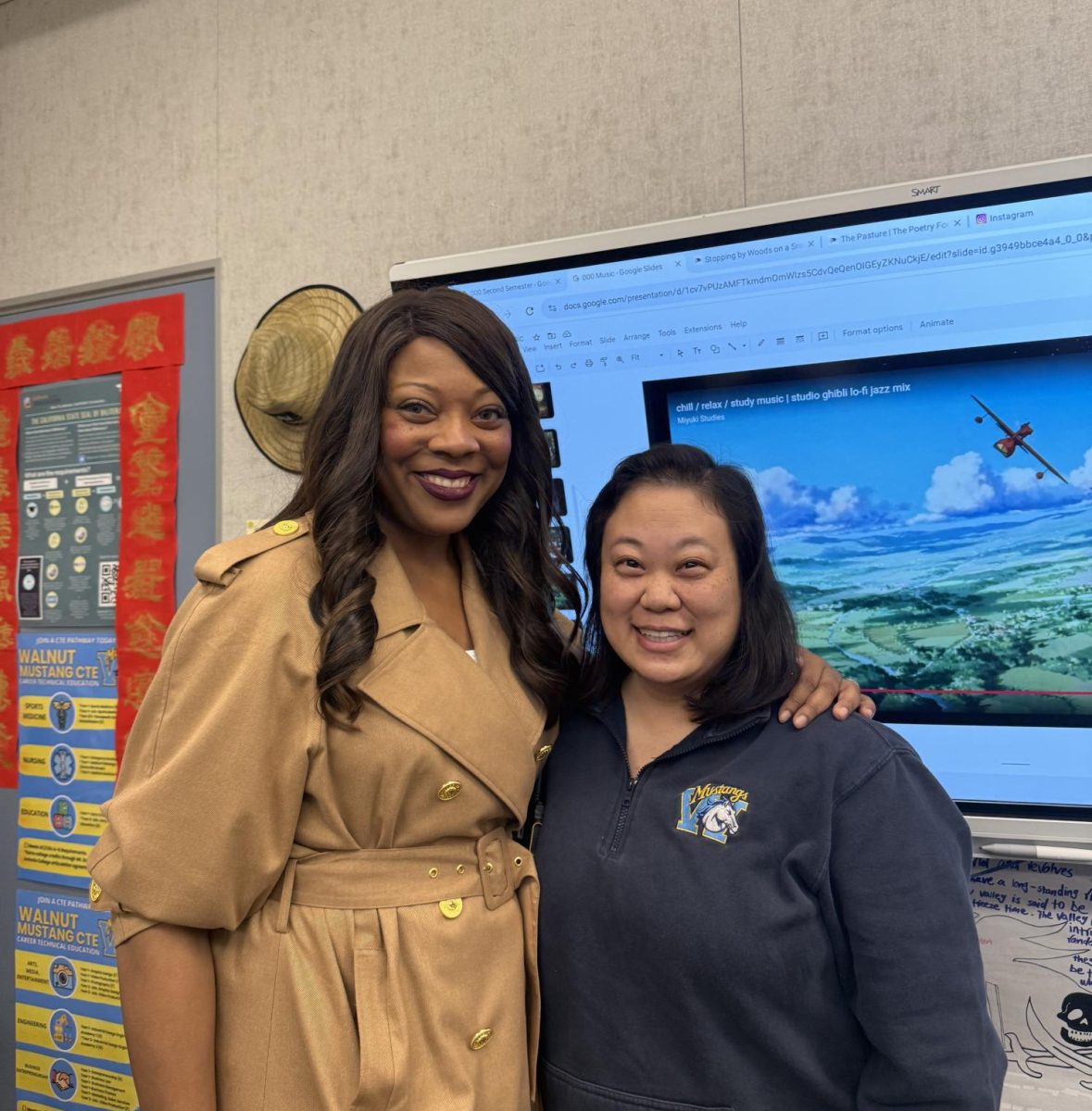 Grade Level Counselor congratulates ELD teacher Rebecca Chai for recognition as Teacher of the Year.