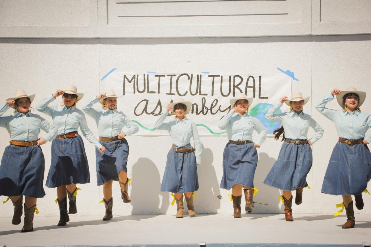 Folklorio Club performs for the Multicultural Assembly.