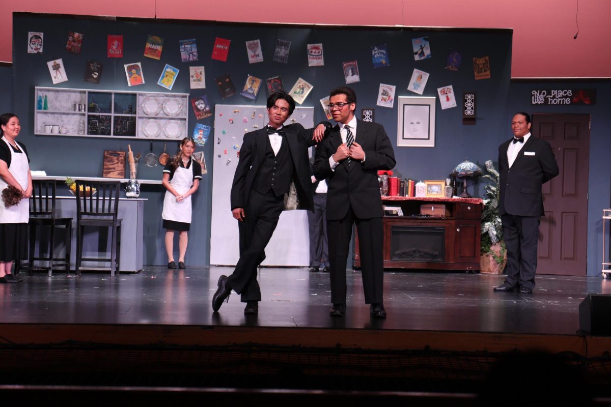 Ready to get married | Senior Isaiah Uman and the best man in the musical, junior Angel Hernandez introduce their characters. “I’m the groom to be and he’s my best man, so I’m all buddy
buddy with him,” Uman said.