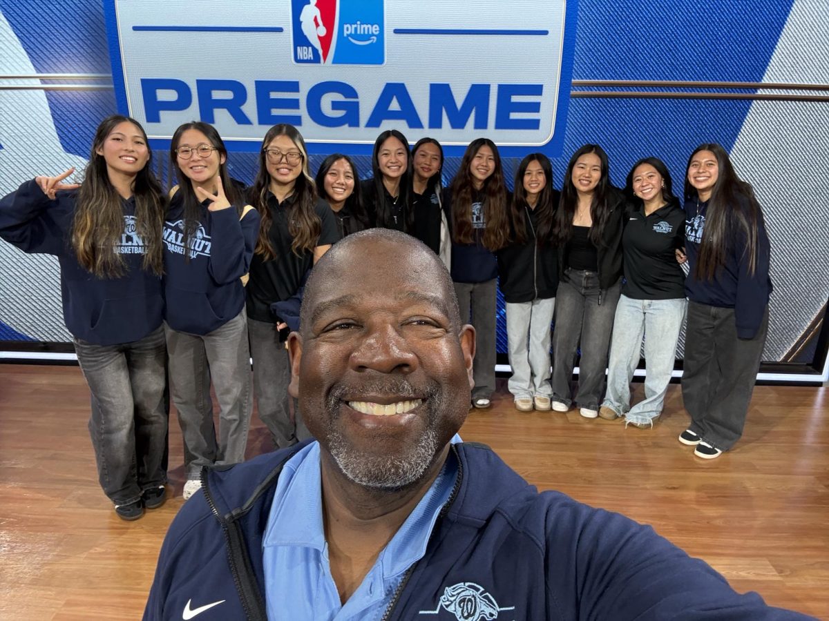 Girls basketball coach and health teacher
Michael James visits the NBA studio with the girls basketball team.