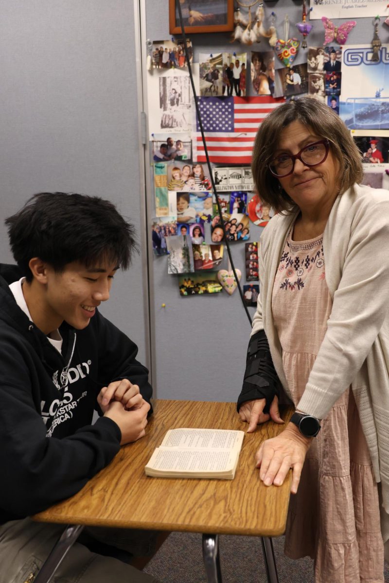 English teacher Renee Juarez-Medina helps senior Matthew Ly in understanding a section in “Bless Me, Ultima.” 