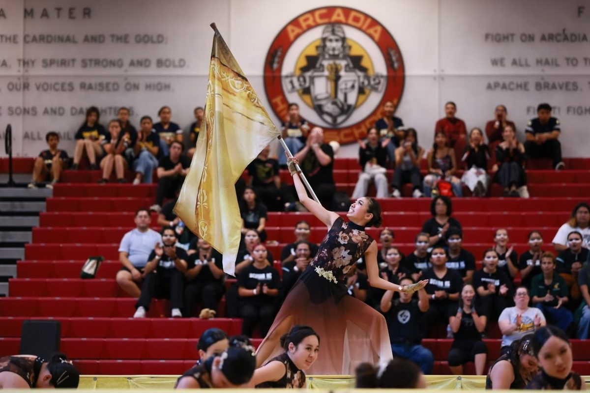 Making history | Senior captain Jasmine Ting does her final pose for the Winter
Guard Show, “Mon Amour”. “I felt powerful and moved because the show is so emotional,” Ting said. (Photo courtesy of Katie Takahashi)